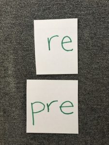 Image of card with "re" and card with "pre"