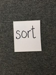 Image of card with "sort"