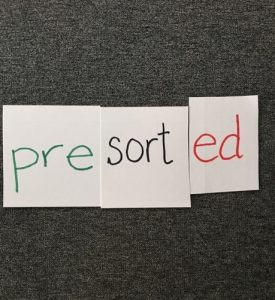 Image of cards "pre", "sort", "ed" together.